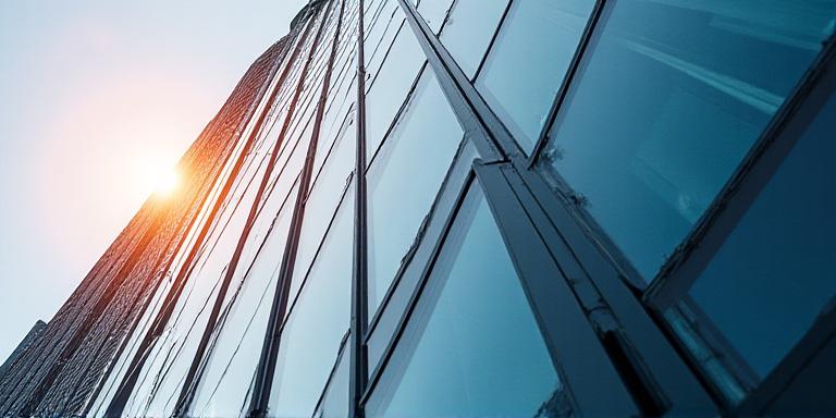 Close-up view of modern architecture at 55 Bishopsgate, London, symbolising transparency and security.